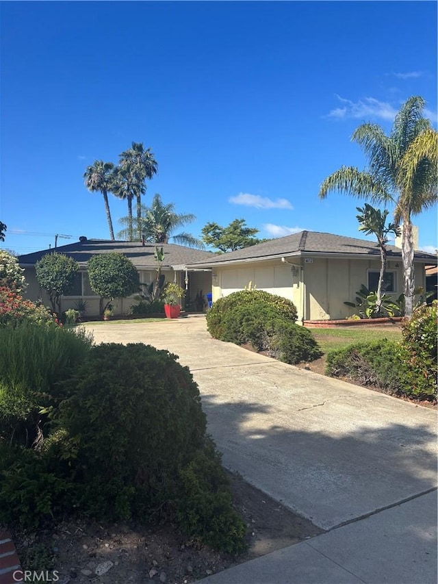 6652 Jackson Dr, San Diego, CA 92119 - single story home with driveway, stucco siding, and a garage
