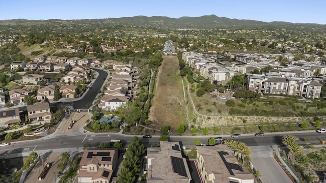 1836 Mesquite, Oceanside, CA 92056 - aerial view of property and surrounding area featuring nearby suburban area and a mountainous background