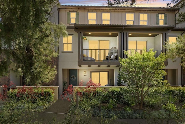 1836 Mesquite, Oceanside, CA 92056 - view of front of house featuring a balcony, board and batten siding, and stucco siding