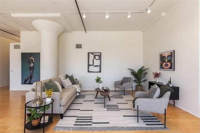 420 S San Pedro St Unit 211, Los Angeles, CA 90013 - living area with track lighting and light wood-style flooring
