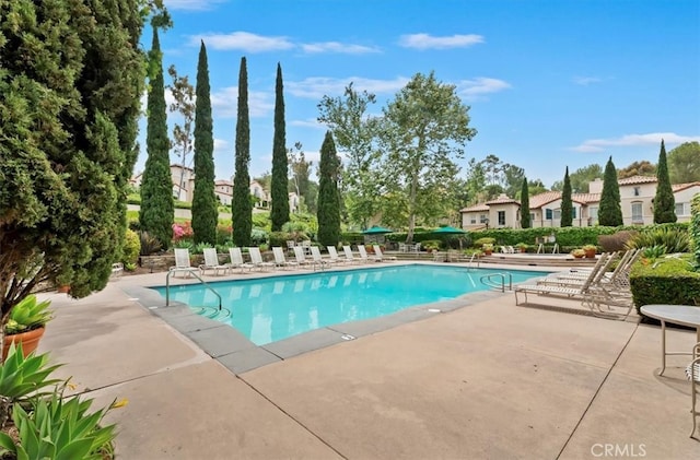 1 Sorrento Ct, Newport Coast, CA 92657 - community pool featuring a patio area