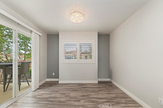 1 Sorrento Ct, Newport Coast, CA 92657 - unfurnished room with plenty of natural light, wood finished floors, and baseboards