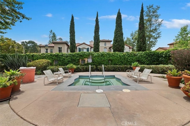 1 Sorrento Ct, Newport Coast, CA 92657 - view of pool featuring a hot tub and a patio