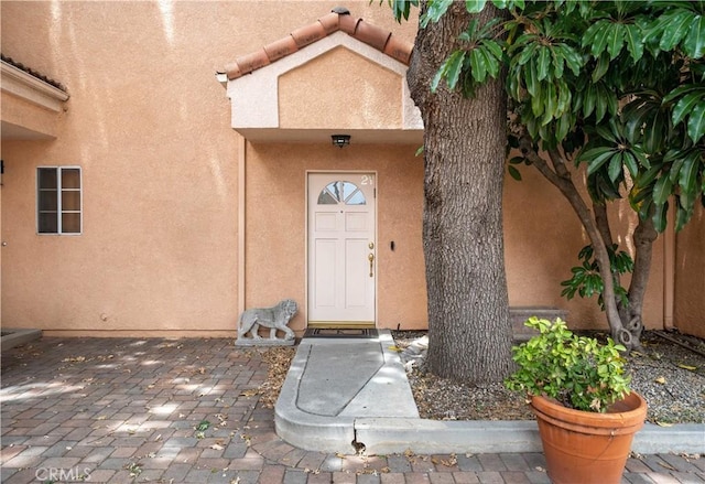 5200 White Oak Ave Unit 21, Encino, CA 91316 - doorway to property with stucco siding