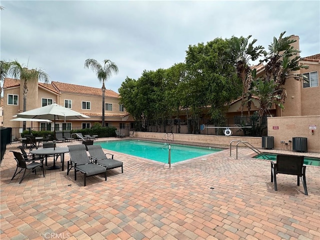 5200 White Oak Ave Unit 21, Encino, CA 91316 - community pool featuring a patio area and central air condition unit