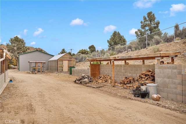 1679 Desert Front Rd, Wrightwood, CA 92397 - view of street featuring exterior structure