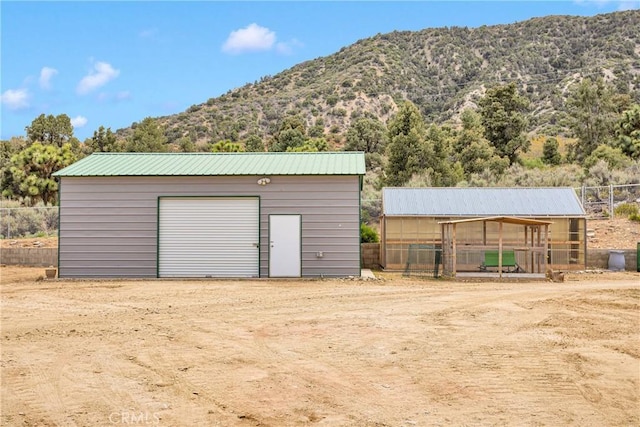 1679 Desert Front Rd, Wrightwood, CA 92397 - detached garage featuring a mountain view