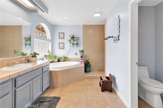 1679 Desert Front Rd, Wrightwood, CA 92397 - full bathroom with vanity, a garden tub, tile patterned floors, toilet, and a tile shower