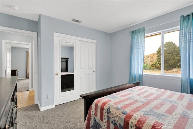1679 Desert Front Rd, Wrightwood, CA 92397 - bedroom featuring carpet floors, baseboards, and a closet