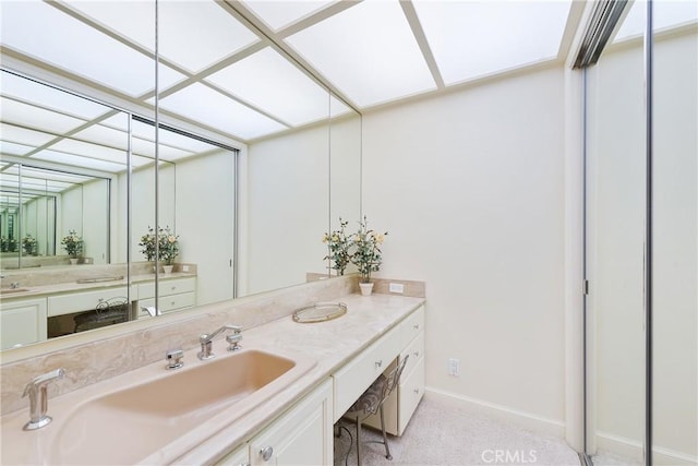19043 Citronia St, Northridge, CA 91324 - bathroom featuring baseboards and vanity