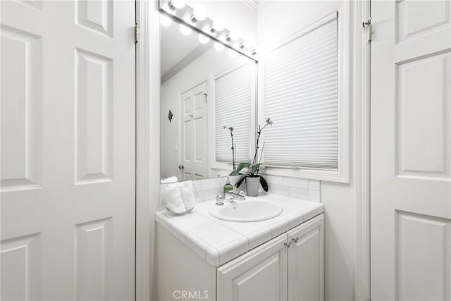 19043 Citronia St, Northridge, CA 91324 - bathroom with vanity and ornamental molding