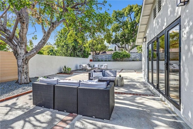 1035 Medford Rd, Pasadena, CA 91107 - fenced backyard with an outdoor living space and a patio area