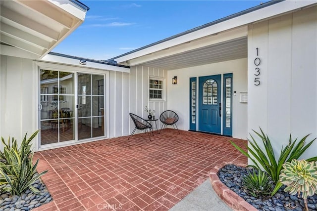 1035 Medford Rd, Pasadena, CA 91107 - view of exterior entry with a porch and board and batten siding