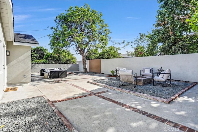1035 Medford Rd, Pasadena, CA 91107 - view of patio with an outdoor living space with a fire pit