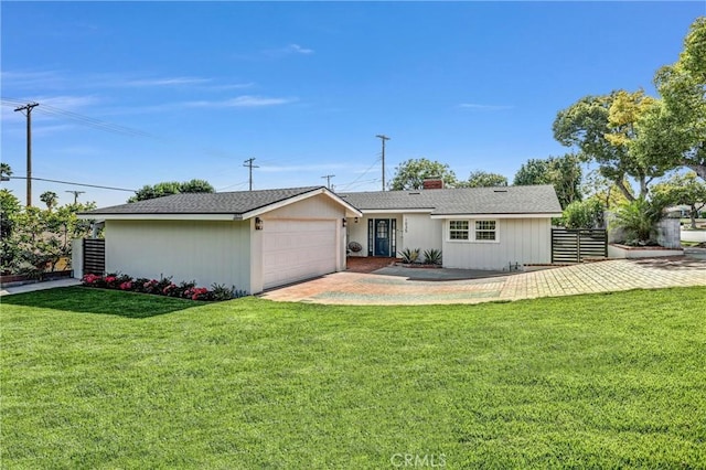 1035 Medford Rd, Pasadena, CA 91107 - rear view of house featuring a garage, a chimney, and driveway