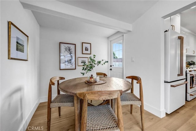 1035 Medford Rd, Pasadena, CA 91107 - dining area with baseboards and light wood-style flooring