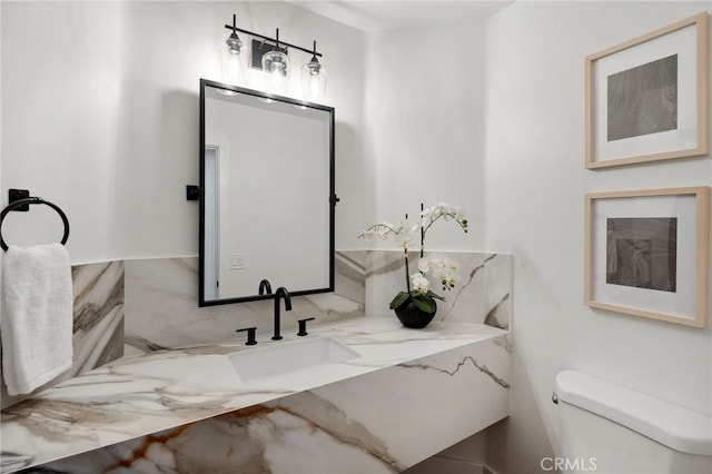 26065 Charing Cross Rd, Valencia, CA 91355 - half bath featuring vanity and toilet