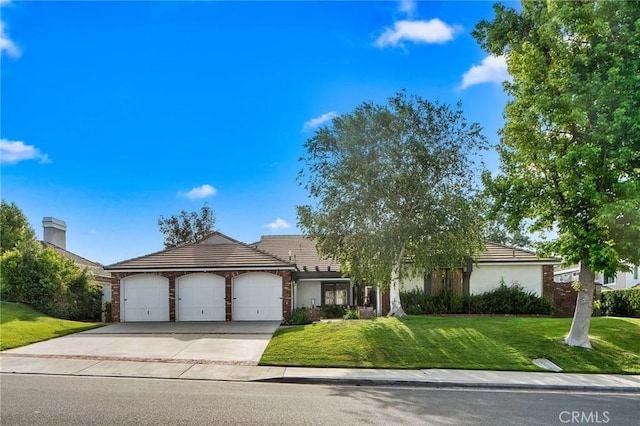 26065 Charing Cross Rd, Valencia, CA 91355 - view of front of home featuring a garage, concrete driveway, a front lawn, stucco siding, and a tiled roof