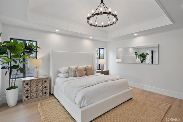 26065 Charing Cross Rd, Valencia, CA 91355 - bedroom featuring a raised ceiling, a chandelier, ornamental molding, wood finished floors, and recessed lighting