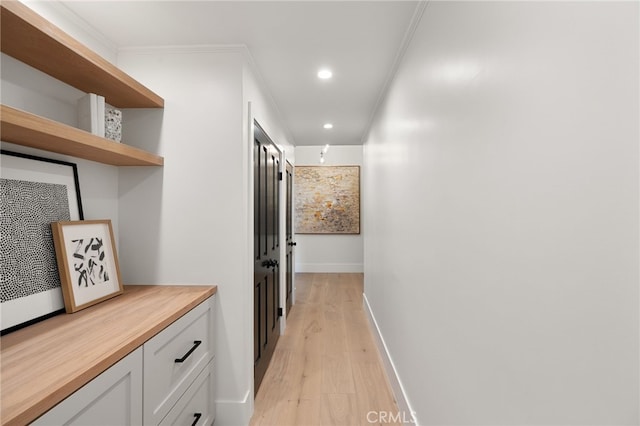 26065 Charing Cross Rd, Valencia, CA 91355 - hallway featuring light wood-type flooring, recessed lighting, ornamental molding, and baseboards