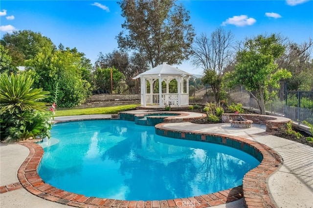 26065 Charing Cross Rd, Valencia, CA 91355 - view of swimming pool featuring a gazebo and a pool with connected hot tub