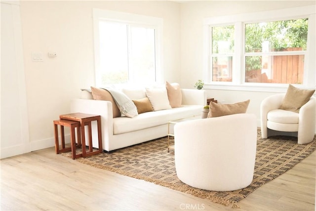 3222 E 10th St, Long Beach, CA 90804 - living room featuring wood finished floors and baseboards