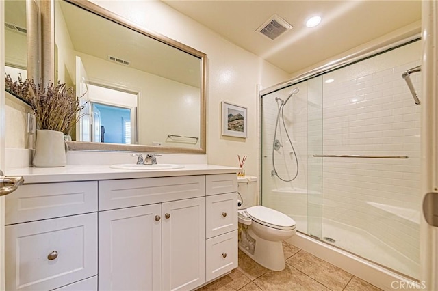 24207 Via Perla, Valencia, CA 91354 - full bathroom with toilet, tile patterned flooring, a stall shower, and vanity