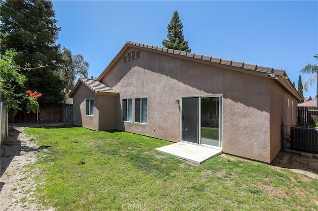 11017 Tipperary Dr, Bakersfield, CA 93311 - back of house featuring central air condition unit and stucco siding