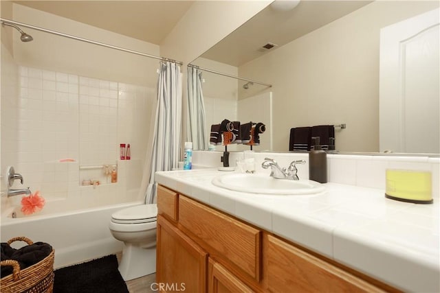 11017 Tipperary Dr, Bakersfield, CA 93311 - bathroom featuring shower / bath combo, vanity, and toilet