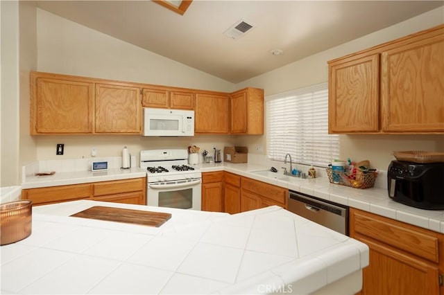 11017 Tipperary Dr, Bakersfield, CA 93311 - kitchen with white appliances, a sink, and lofted ceiling