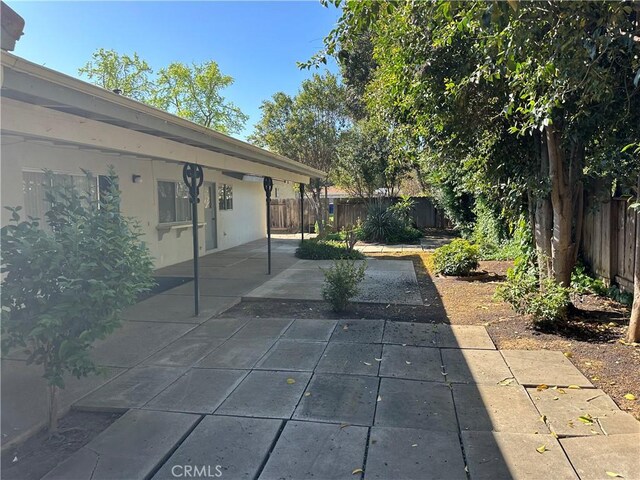 2915 El Camino Real, Merced, CA 95340 - fenced backyard featuring a patio