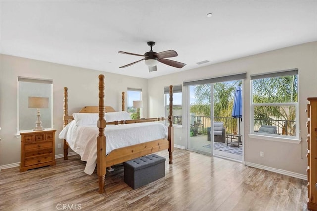 45976 Camino Rubi, Temecula, CA 92592 - bedroom with access to exterior, wood finished floors, and baseboards