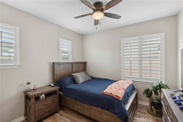 45976 Camino Rubi, Temecula, CA 92592 - bedroom featuring wood finished floors, baseboards, and a ceiling fan