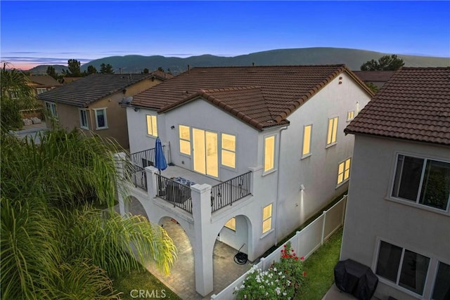 45976 Camino Rubi, Temecula, CA 92592 - rear view of property with a balcony, a tiled roof, stucco siding, and a mountain view