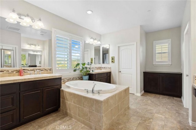 45976 Camino Rubi, Temecula, CA 92592 - bathroom featuring a garden tub and two vanities