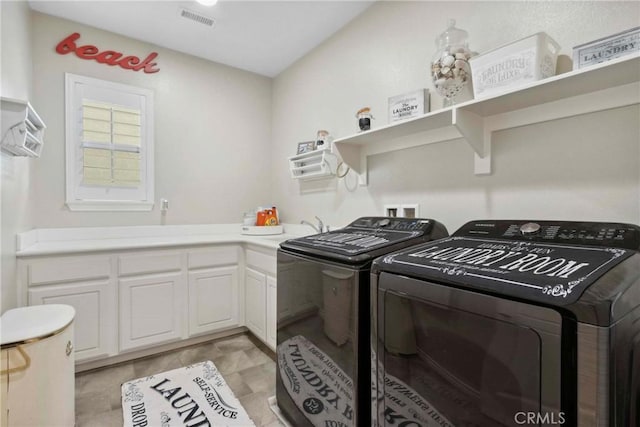 45976 Camino Rubi, Temecula, CA 92592 - laundry area with washer and clothes dryer and cabinet space
