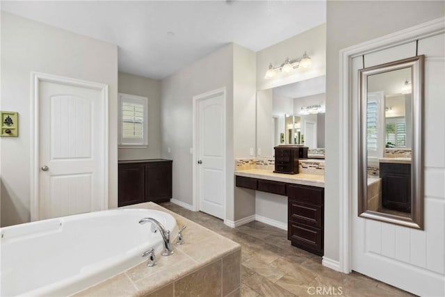 45976 Camino Rubi, Temecula, CA 92592 - full bathroom featuring a bath, vanity, and baseboards