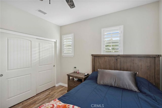45976 Camino Rubi, Temecula, CA 92592 - bedroom with wood finished floors, ceiling fan, a closet, and baseboards