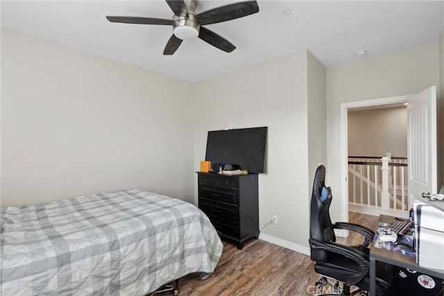 45976 Camino Rubi, Temecula, CA 92592 - bedroom featuring wood finished floors, baseboards, an office area, and a ceiling fan
