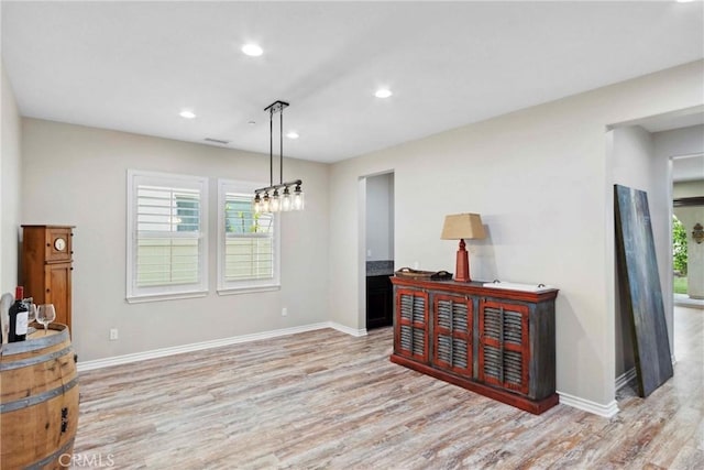 45976 Camino Rubi, Temecula, CA 92592 - dining area with healthy amount of natural light, light wood-type flooring, baseboards, recessed lighting, and a chandelier