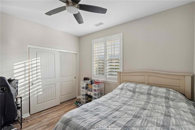 45976 Camino Rubi, Temecula, CA 92592 - bedroom with wood finished floors, a closet, and ceiling fan