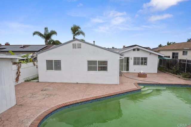 3999 Arey Dr, San Diego, CA 92154 - back of property with a patio, stucco siding, and a fenced backyard