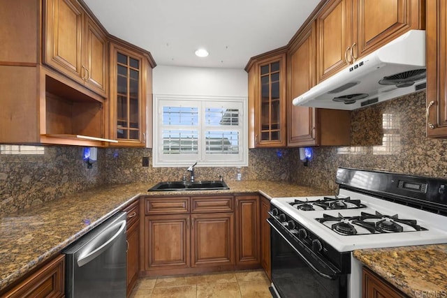 3999 Arey Dr, San Diego, CA 92154 - kitchen featuring gas range gas stove, under cabinet range hood, a sink, stainless steel dishwasher, and brown cabinets
