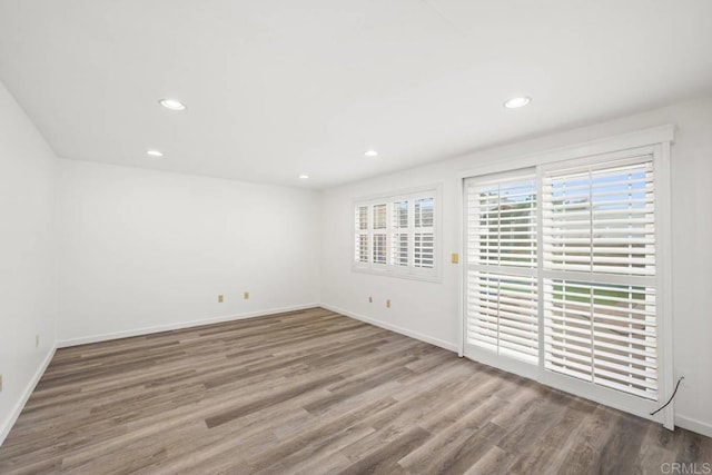 3999 Arey Dr, San Diego, CA 92154 - unfurnished room featuring wood finished floors, recessed lighting, and baseboards