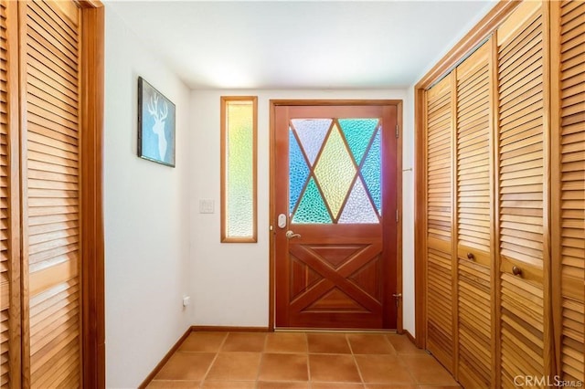 1954 Nob Hill Dr, Running Springs, CA 92382 - foyer with baseboards and light tile patterned floors