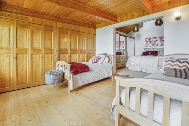 1954 Nob Hill Dr, Running Springs, CA 92382 - bedroom featuring light wood-type flooring and wooden ceiling with exposed beams