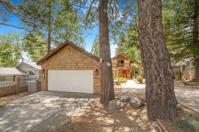 1954 Nob Hill Dr, Running Springs, CA 92382 - view of front facade featuring driveway and an attached garage