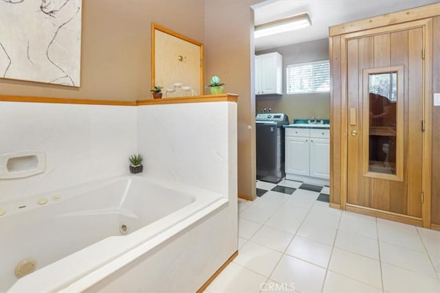 1954 Nob Hill Dr, Running Springs, CA 92382 - full bathroom featuring washer / clothes dryer, vanity, and a jetted tub