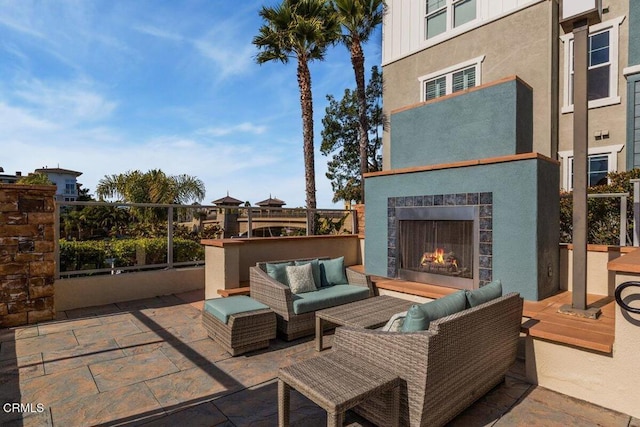 1503 Windshore Way, Oxnard, CA 93035 - view of patio with an outdoor living space with a fireplace