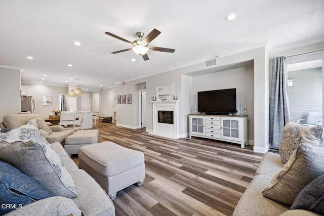 1503 Windshore Way, Oxnard, CA 93035 - living room featuring ornamental molding, ceiling fan, recessed lighting, wood finished floors, and baseboards